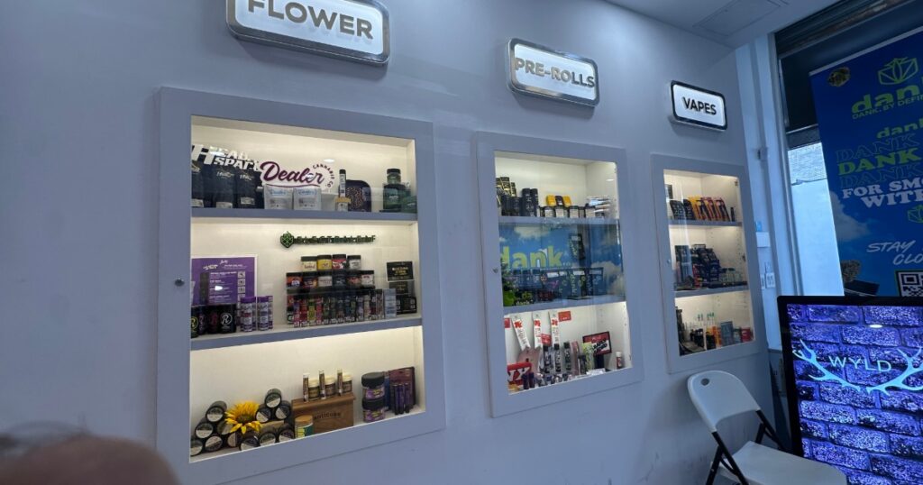 Modern NYC licensed dispensary interior with clean retail design and product displays