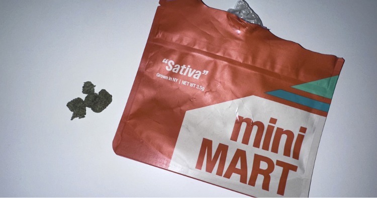 A side-angle shot of the Mini MART Tropicana Cookies pouch showing the listed terpene profile, including Myrcene, Limonene, and Pinene.